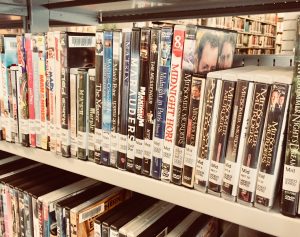 dvds on a bookshelf
